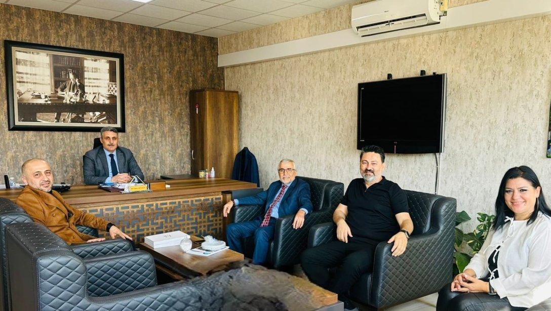 İzmir Ticaret Odası Eğitim Meslek Komitesi'nden Bayraklı İlçe Milli Eğitim Müdürü'ne ziyaret